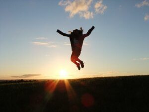 Woman jumping for joy.