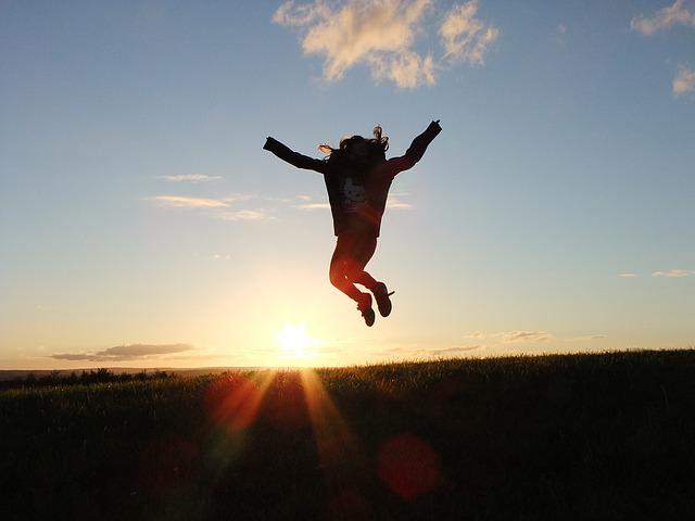 Woman jumping for joy.