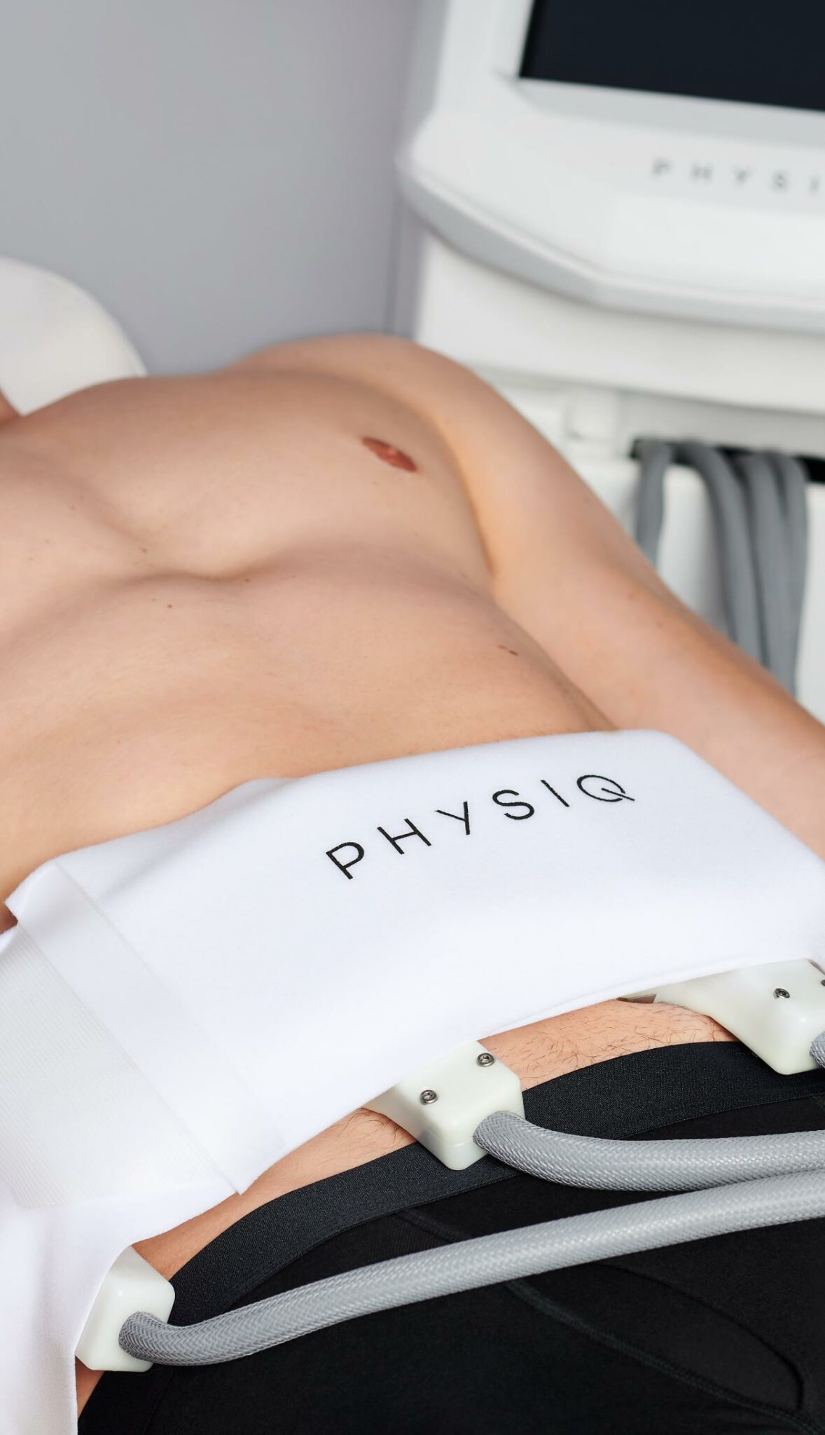PHYSIQ applicators positioned over the abdomen